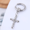 Arete hombre cruz